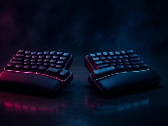 Split ergonomic keyboard separated into two halves with red and blue underglow